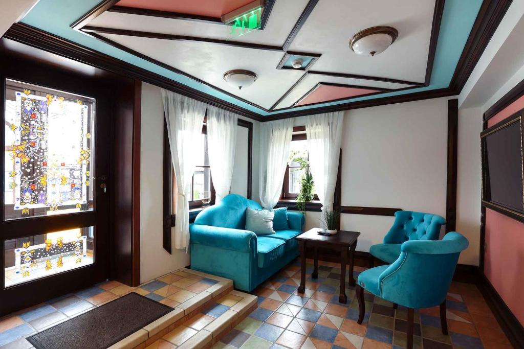 Posezení v ubytování Armaco Residence