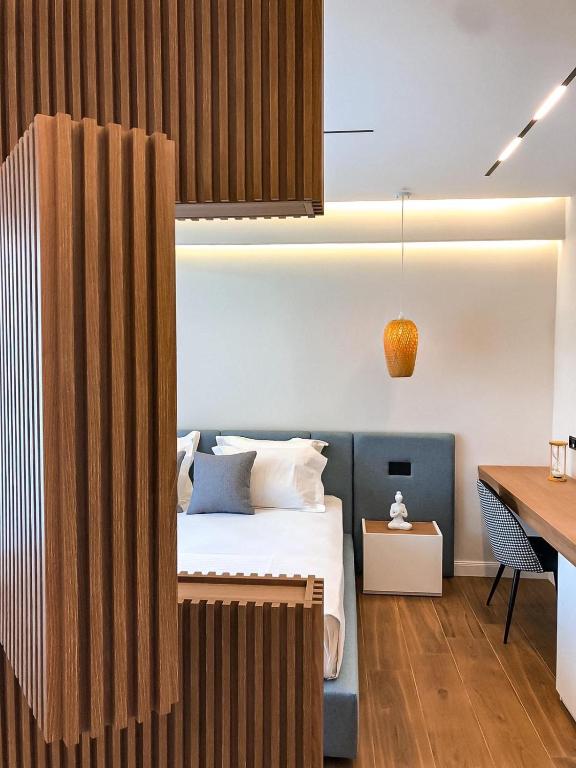Postel nebo postele na pokoji v ubytování Hotel Teuta