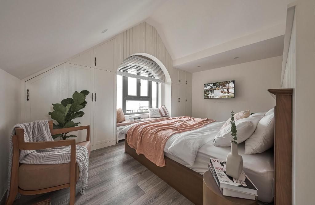 Postel nebo postele na pokoji v ubytování Davilla Đà Lạt Villa Collection