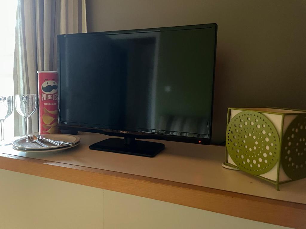 TV a/nebo společenská místnost v ubytování B&B Des Bois Sans Nombre