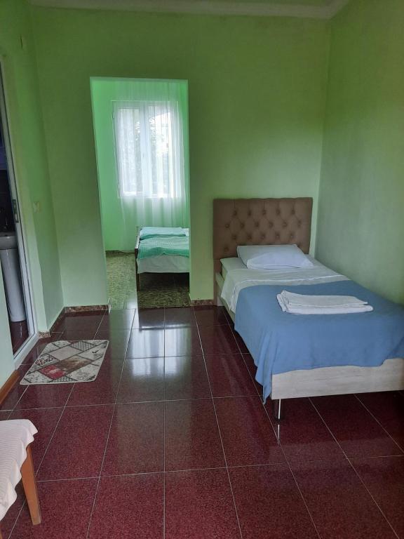 Postel nebo postele na pokoji v ubytování Guest house LIA