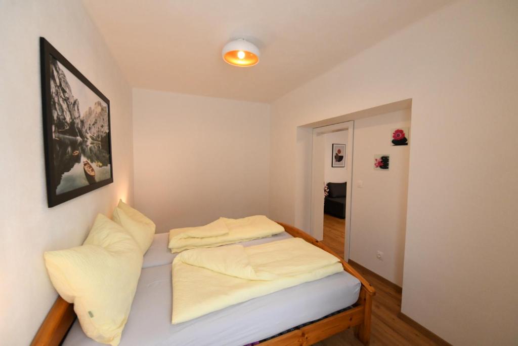 Postel nebo postele na pokoji v ubytování Ferienapartments 31erHaus