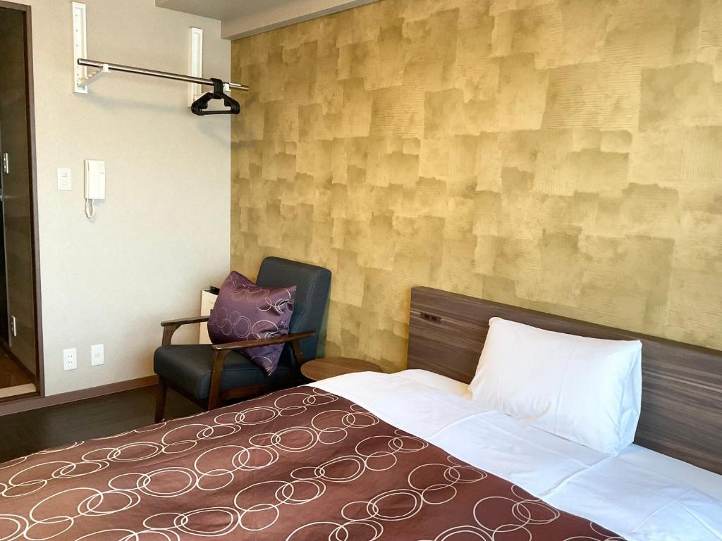 Postel nebo postele na pokoji v ubytování Comfort stay Miyabi
