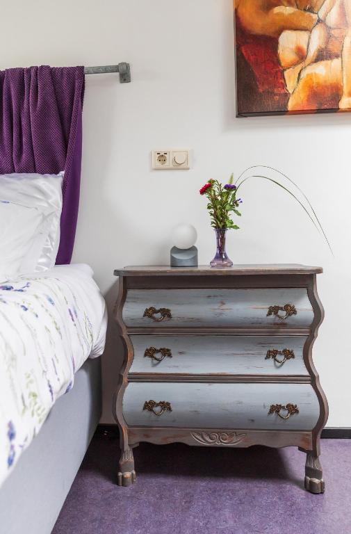 Postel nebo postele na pokoji v ubytování B&B van Dinter
