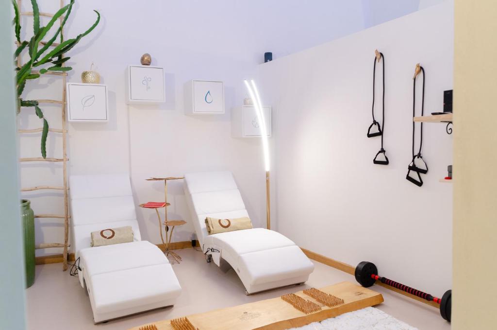 Postel nebo postele na pokoji v ubytování Oppure - Centro Città Spa & Relax