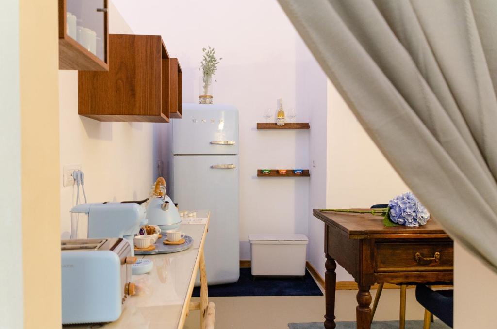 Kuchyň nebo kuchyňský kout v ubytování Oppure - Centro Città Spa & Relax