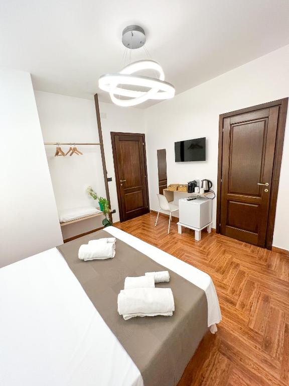 Postel nebo postele na pokoji v ubytování The Apartment Agrigento
