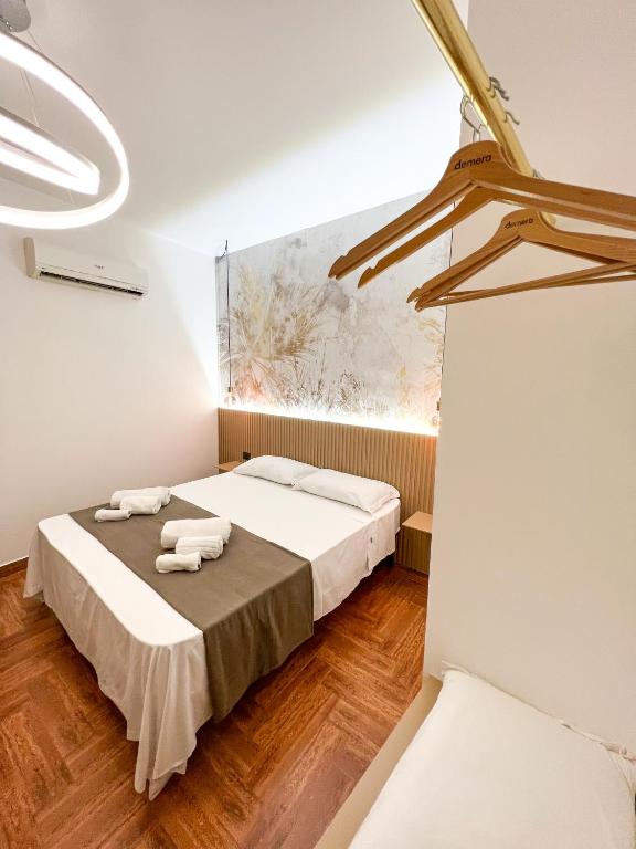 Postel nebo postele na pokoji v ubytování The Apartment Agrigento