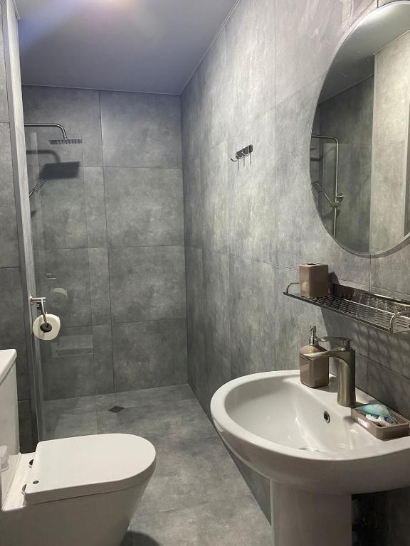 Baðherbergi á Hotel Amigo II
