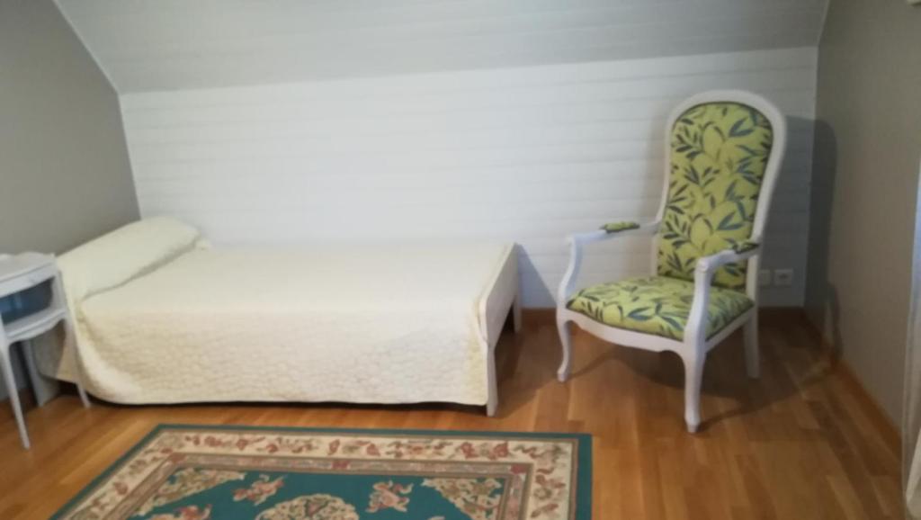 Postel nebo postele na pokoji v ubytování Chambres d'hôtes Chez Dumitra