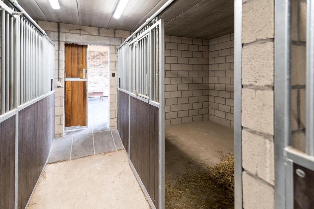 Postel nebo postele na pokoji v ubytování Logies Op 't Gestel