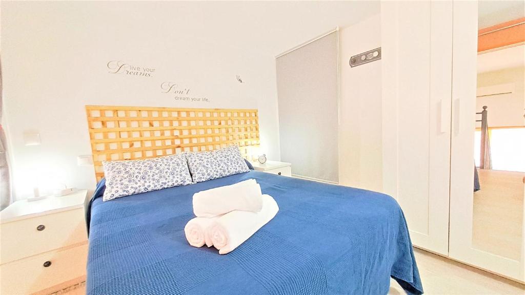 Postel nebo postele na pokoji v ubytování La Vaguada loft