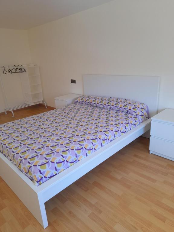 מיטה או מיטות בחדר ב-Duplex Ajdir Al hoceima