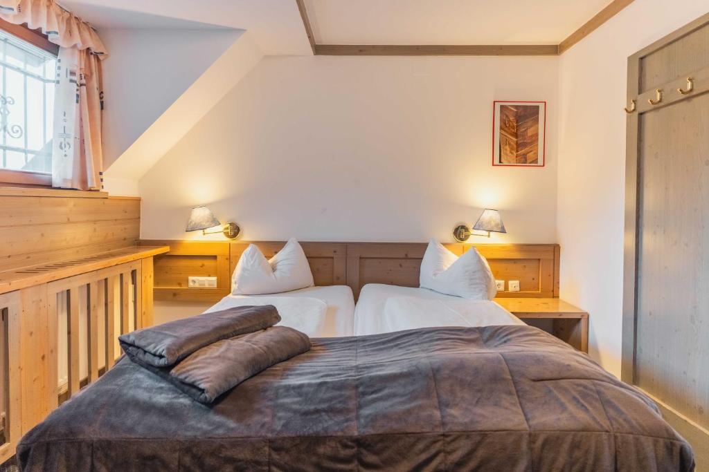 Postelja oz. postelje v sobi nastanitve Hotel Krvavec
