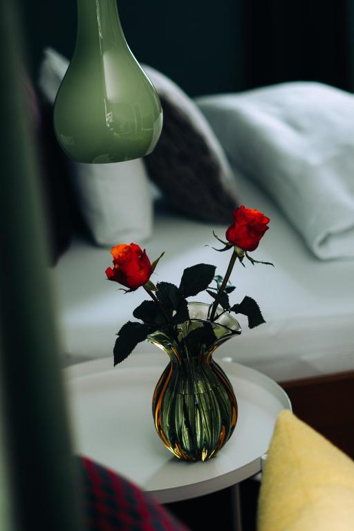 Postel nebo postele na pokoji v ubytování Molo Rouge - Boutiquehotel & Café