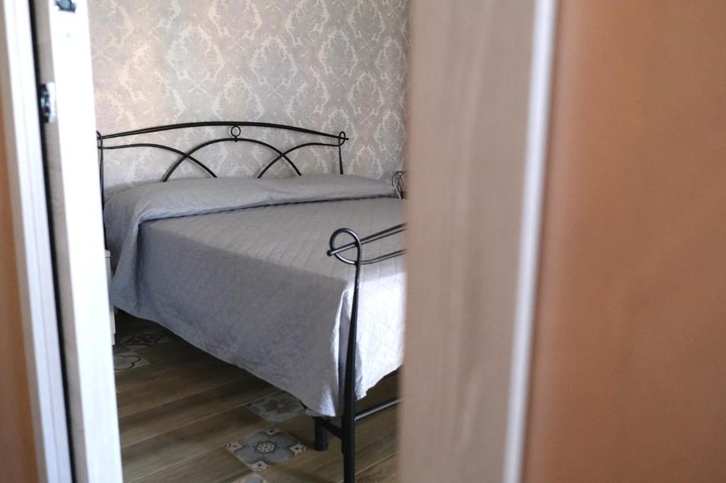 Posteľ alebo postele v izbe v ubytovaní Sweet House Melania