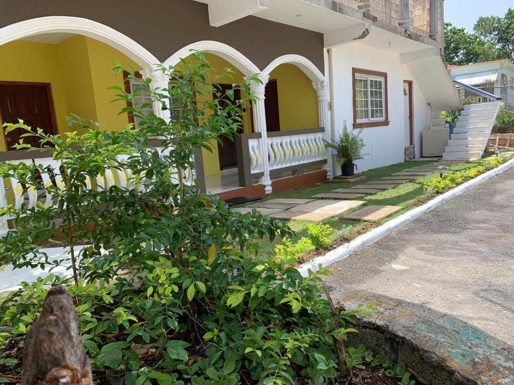 Jardí fora de Mini Cozy Lodging