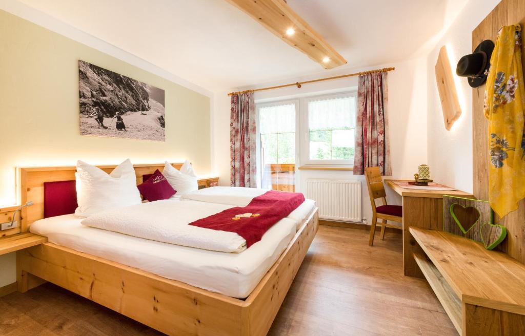 Postel nebo postele na pokoji v ubytování Landhaus Pichler