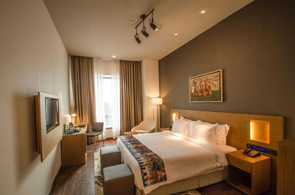 Postel nebo postele na pokoji v ubytování AltAir Boutique Hotel