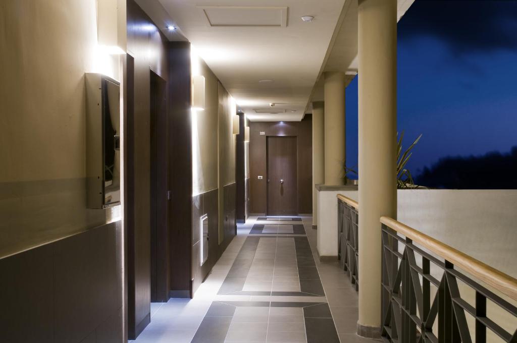 a corridor of a building with a hallway at Hotel Playa Calera in Valle Gran Rey