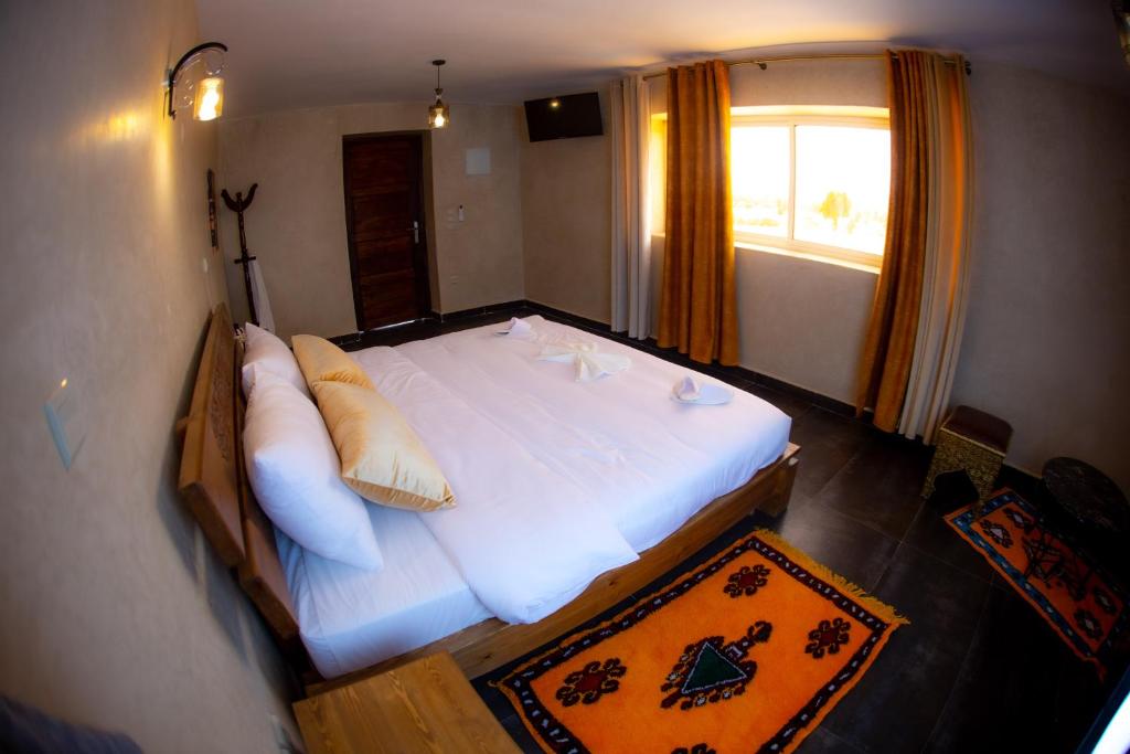 Postel nebo postele na pokoji v ubytování Maison D'hôtes IMINIGRAN & Spa