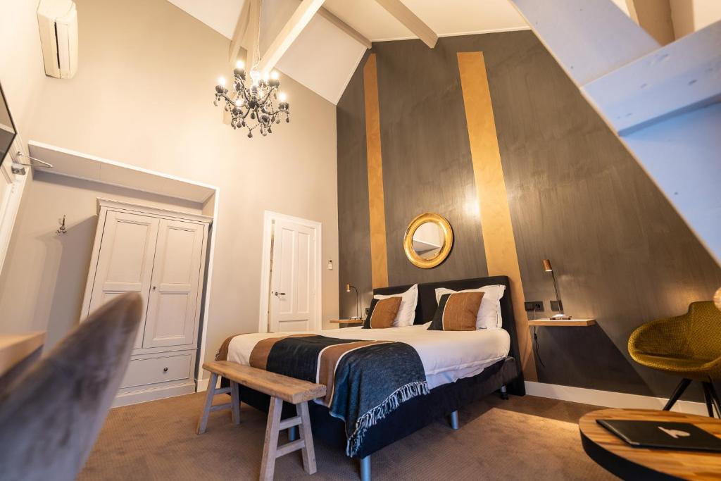 Postel nebo postele na pokoji v ubytování Hotel Montfoort
