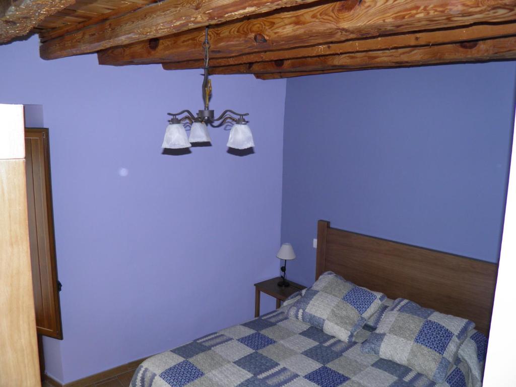 Postel nebo postele na pokoji v ubytování Apartamentos Turísticos Peñafiel