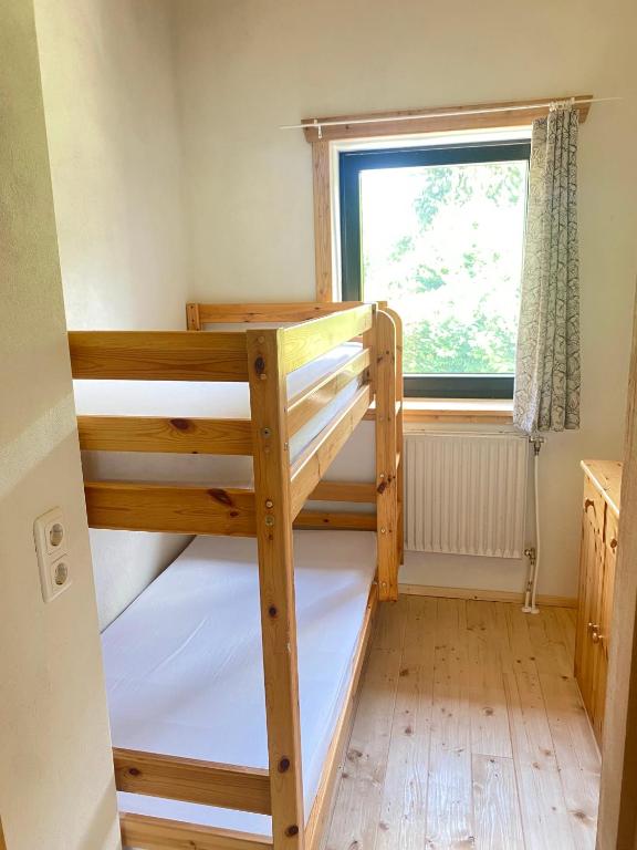Postel nebo postele na pokoji v ubytování Apartment Steinwänd Top 8