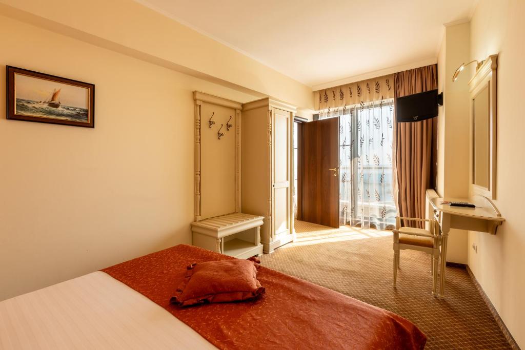 Postel nebo postele na pokoji v ubytování Hotel Hawaii
