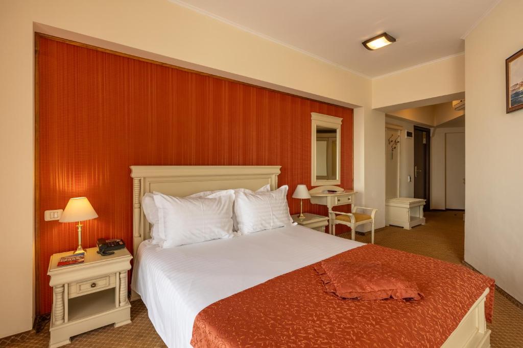 Postel nebo postele na pokoji v ubytování Hotel Hawaii