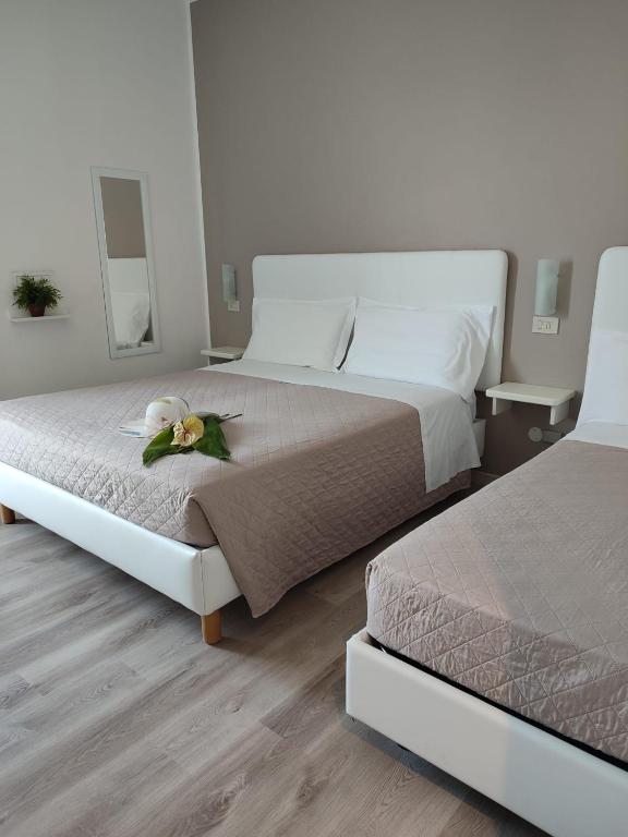 Postel nebo postele na pokoji v ubytování Hotel Madera