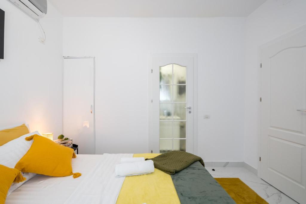 Postel nebo postele na pokoji v ubytování Light-Monza-Unirii