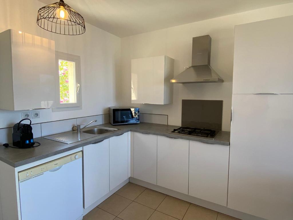 Кухня или мини-кухня в La Citadelle Appartements
