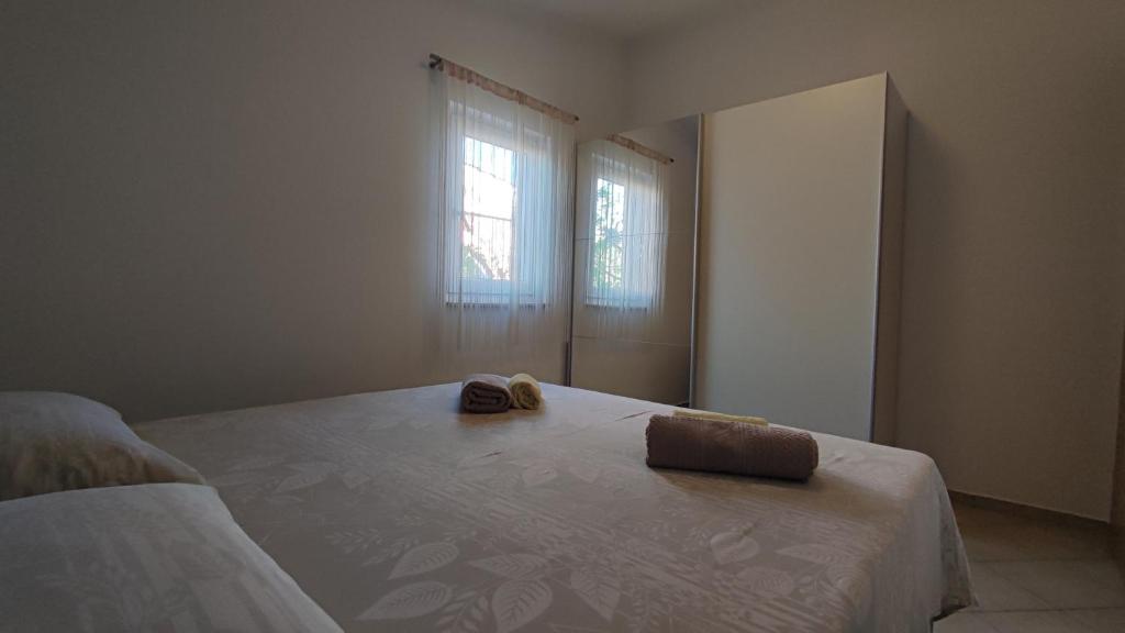Łóżko lub łóżka w pokoju w obiekcie Apartments Ankora Vir
