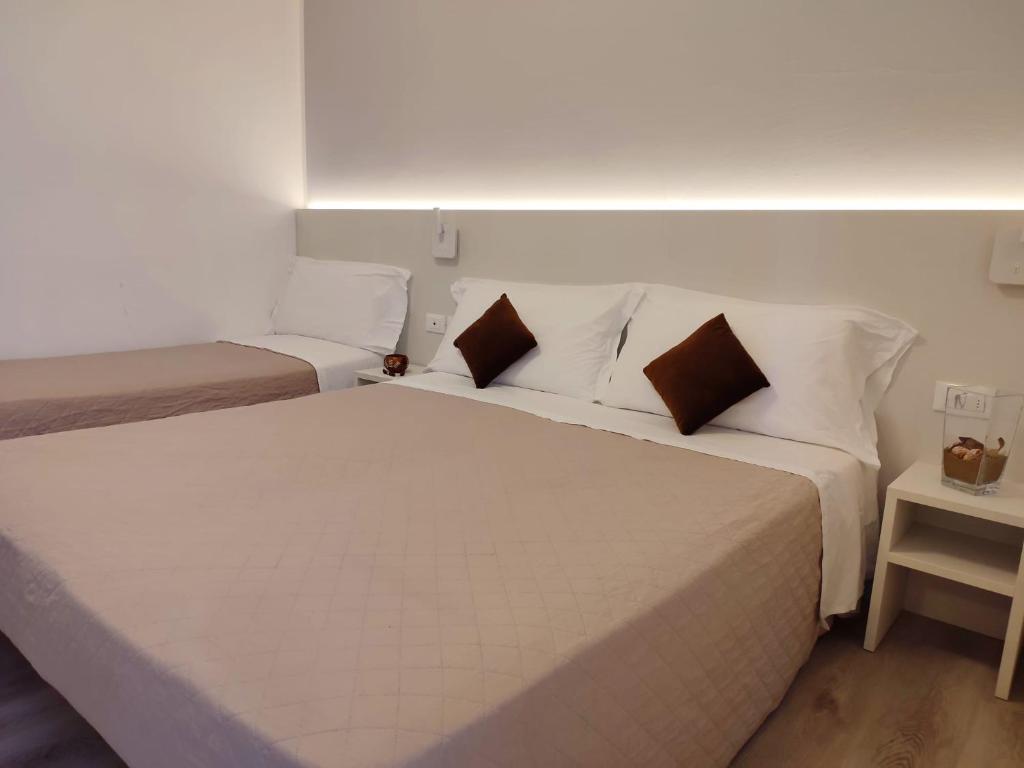 Postel nebo postele na pokoji v ubytování Hotel Madera