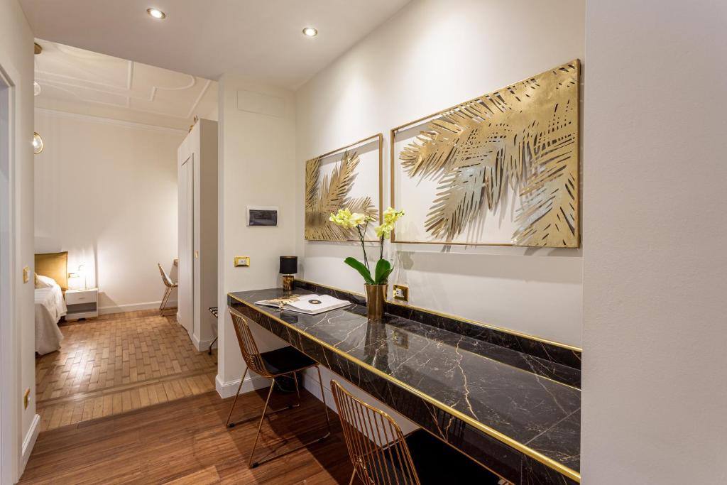 Postel nebo postele na pokoji v ubytování Maison d'Or
