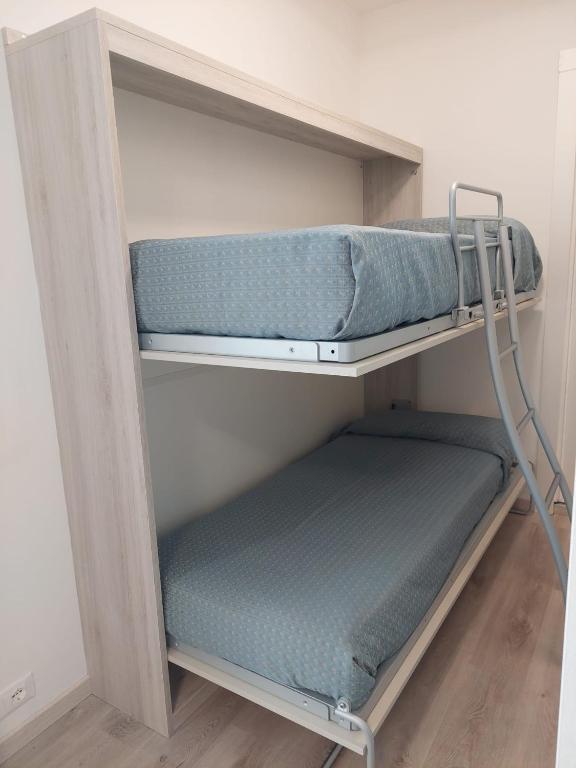 Palanda nebo palandy na pokoji v ubytování Hotel Madera
