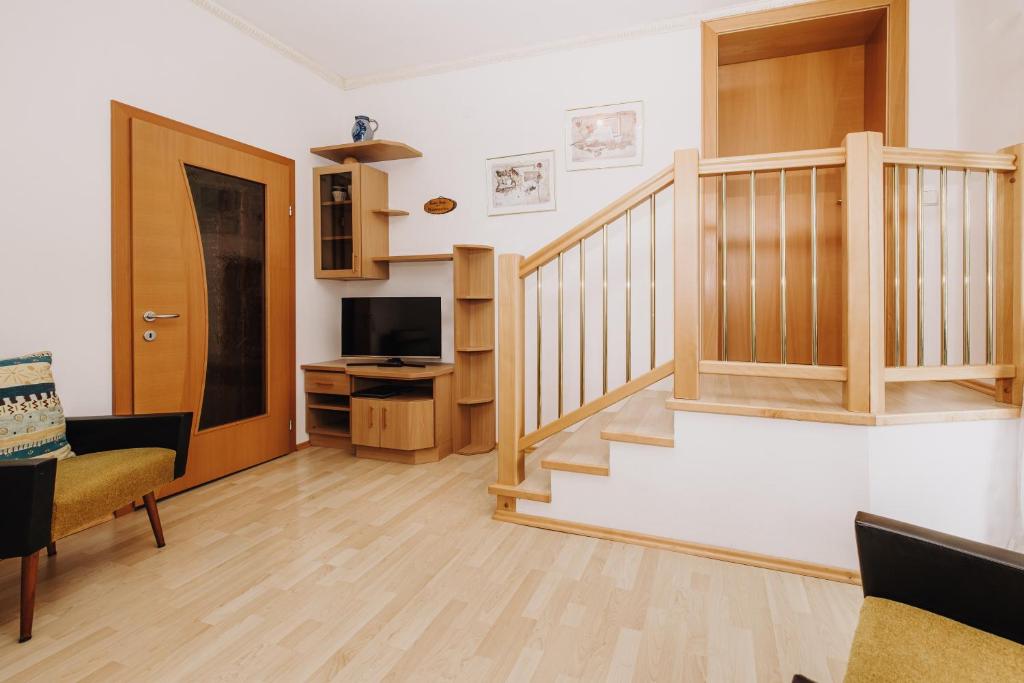 TV a/nebo společenská místnost v ubytování Hotel Garni Tannenhof