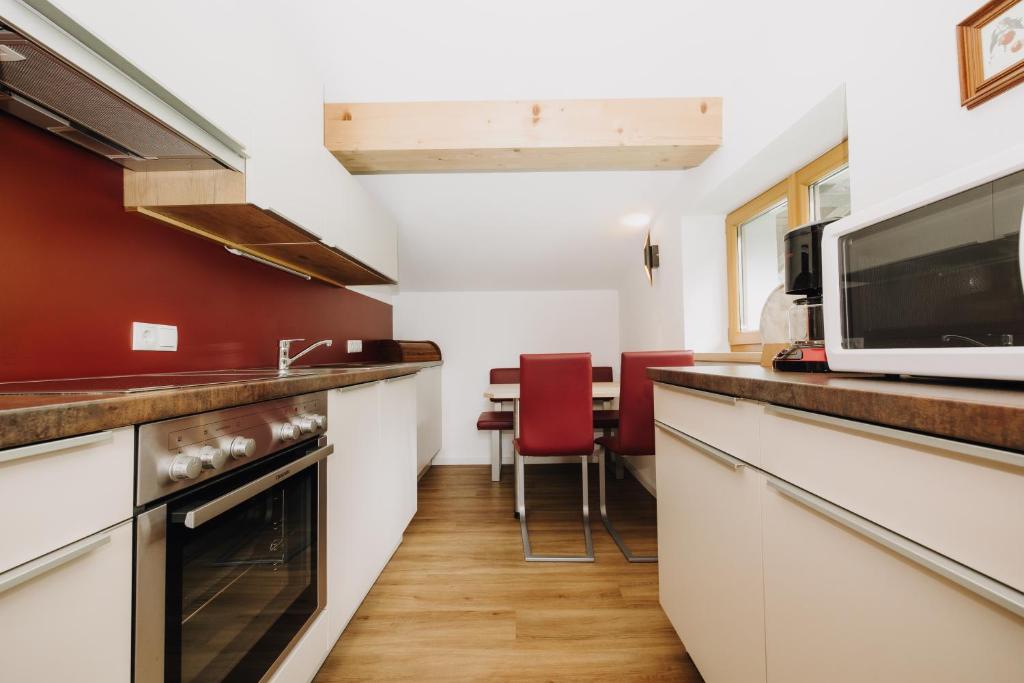 Kuchyň nebo kuchyňský kout v ubytování Hotel Garni Tannenhof