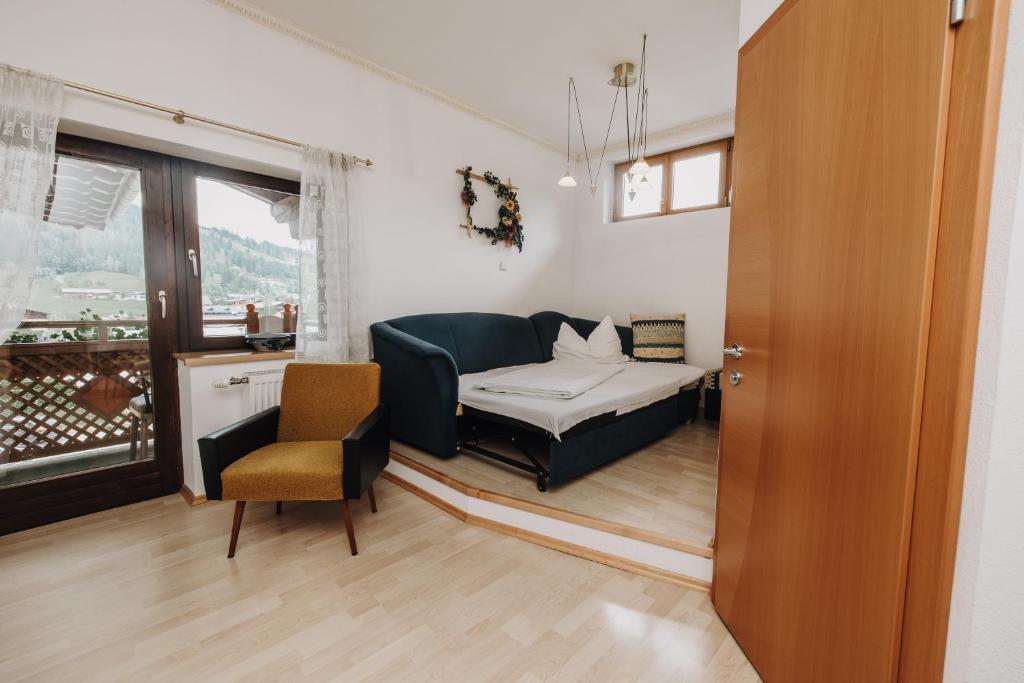 Postel nebo postele na pokoji v ubytování Hotel Garni Tannenhof