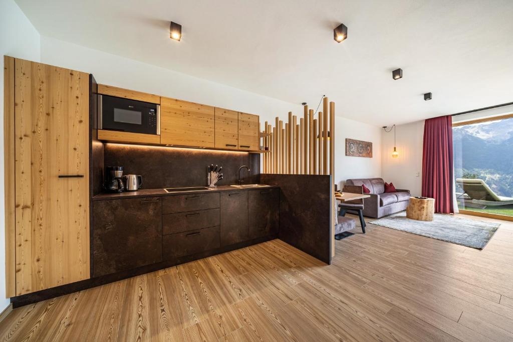Kuchyň nebo kuchyňský kout v ubytování Paflur Lodges Abendrot