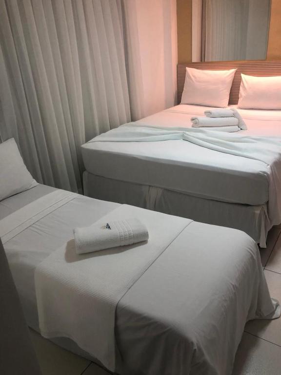 Cama ou camas em um quarto em Hotel Pousada Kairos Manaira