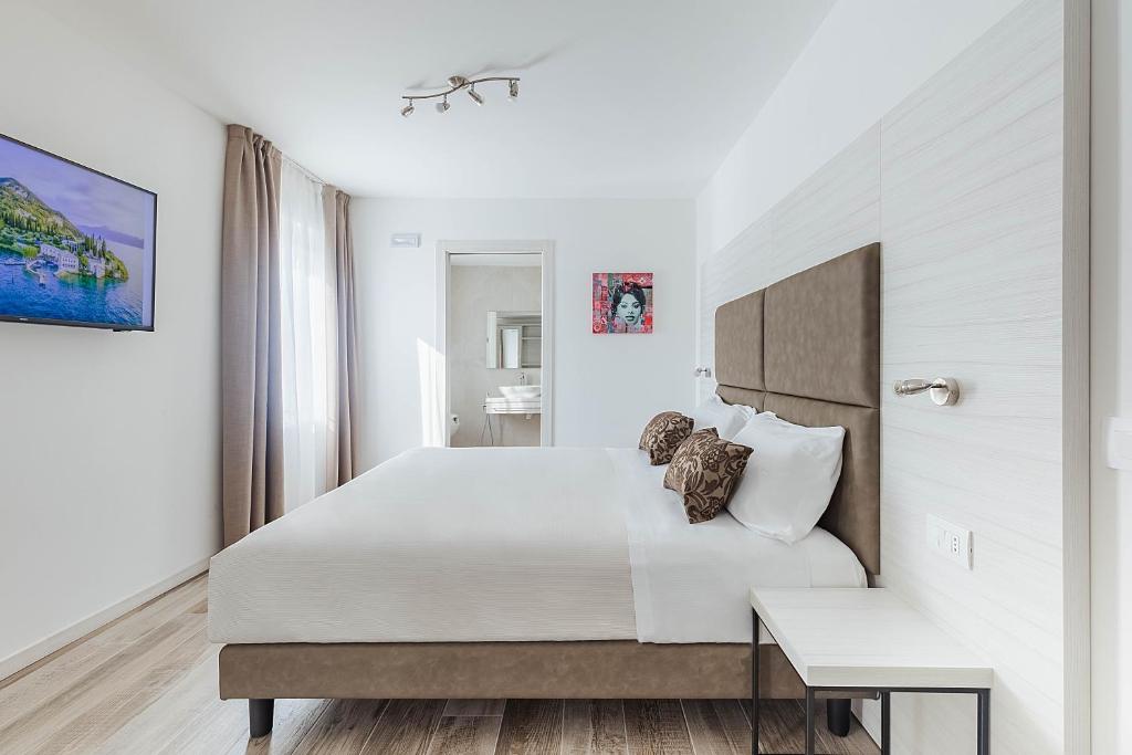 Posteľ alebo postele v izbe v ubytovaní Hotel Giardinetto