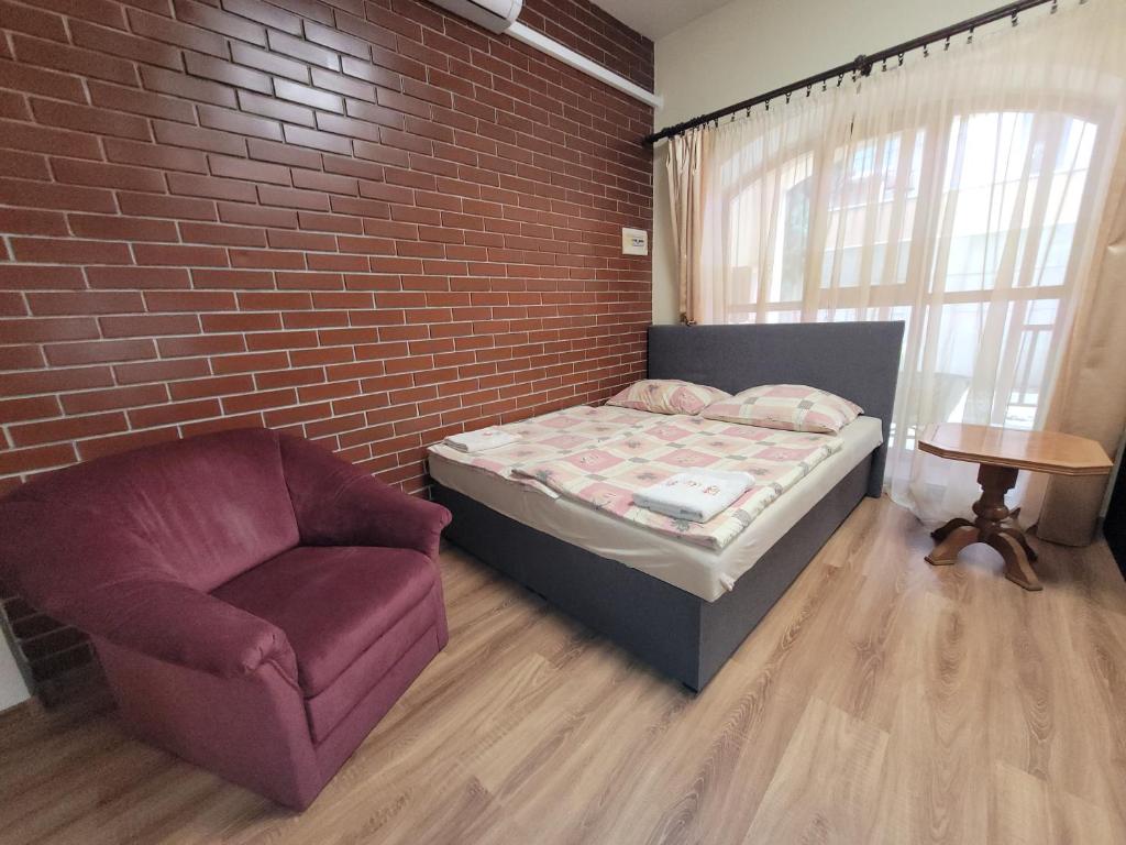 Postel nebo postele na pokoji v ubytování Penzión Korzo