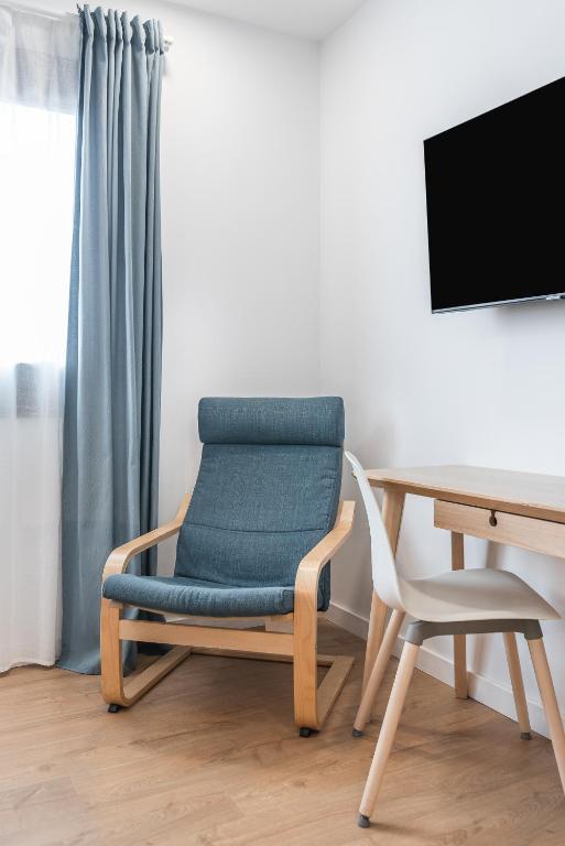 TV a/nebo společenská místnost v ubytování Casa Boissier Ciudad Jardín