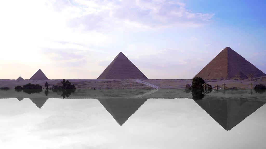 Het zwembad bij of vlak bij Sultan pyramids view INN