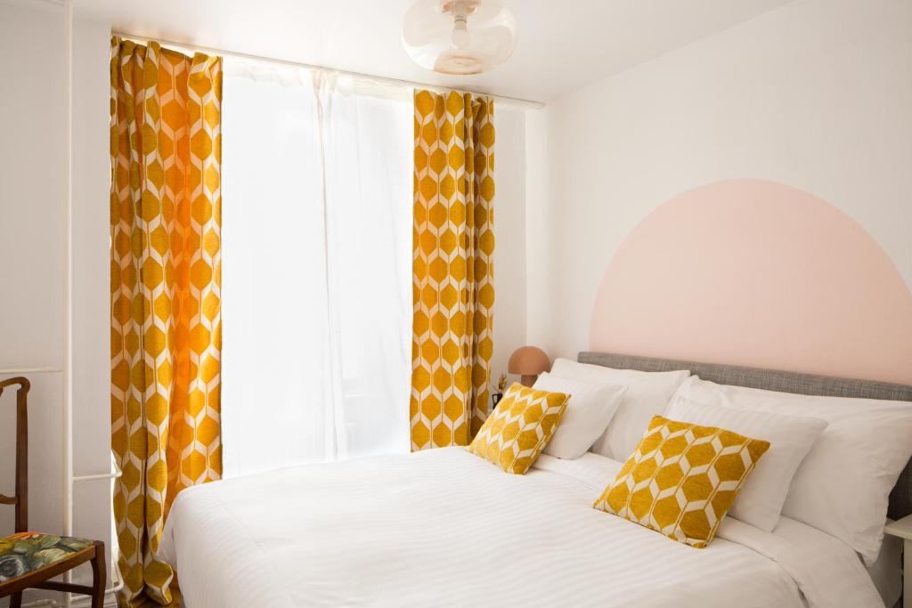 Postel nebo postele na pokoji v ubytování Marché 28 Guesthouse