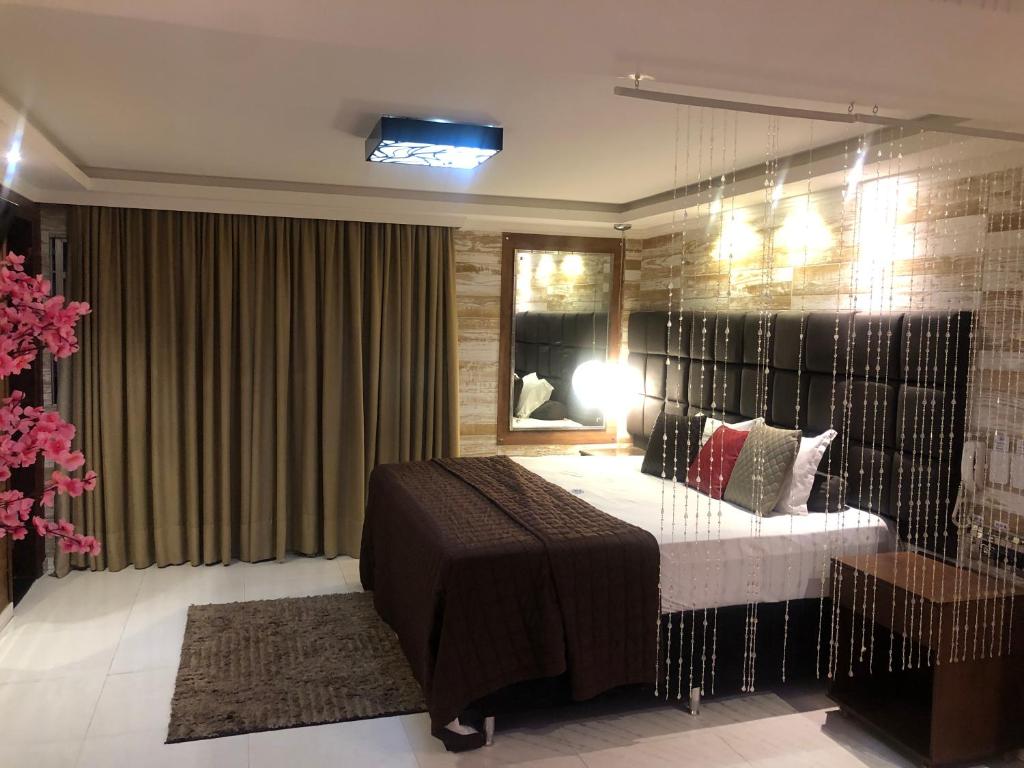 Postel nebo postele na pokoji v ubytování HOTEL BIGSTAR