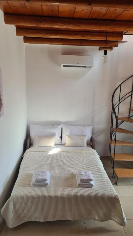 Postel nebo postele na pokoji v ubytování serenissimo A&A