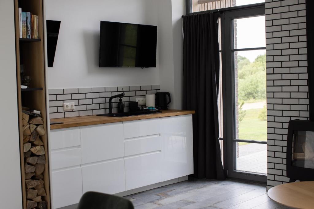 Kuchyň nebo kuchyňský kout v ubytování Utriai Guest Place
